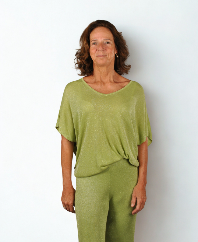 Feestelijke glitter outfit dames – combineer met sieraden en schoenen voor een elegante look.